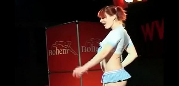 Slutty redhead babe dances dirty